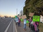 Environmental activists rally outside the U.S. Forest Service office in Medford, January 29, 2025.